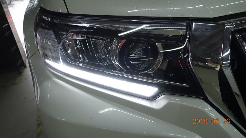 丰田新款普拉多车灯不亮改装双光透镜氙气灯-11